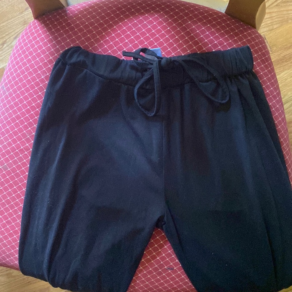 Black tights with flares at the bottom